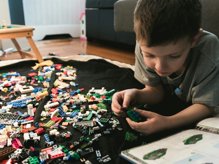 picture of a child and lego pieces and diagrams 